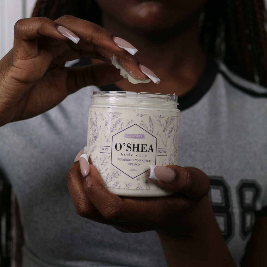 woman scooping lavender shea body butter